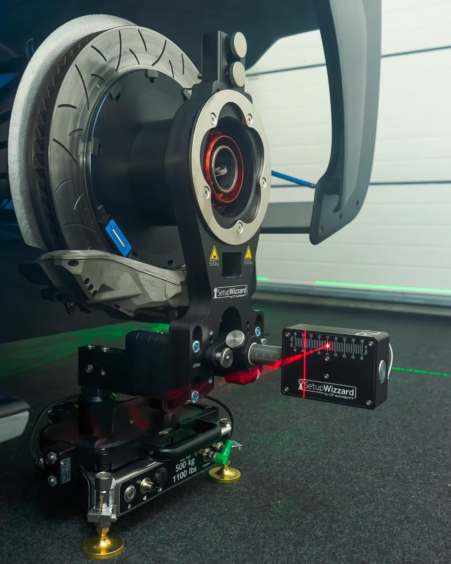 Laser wheel alignment system set up on the Kalana