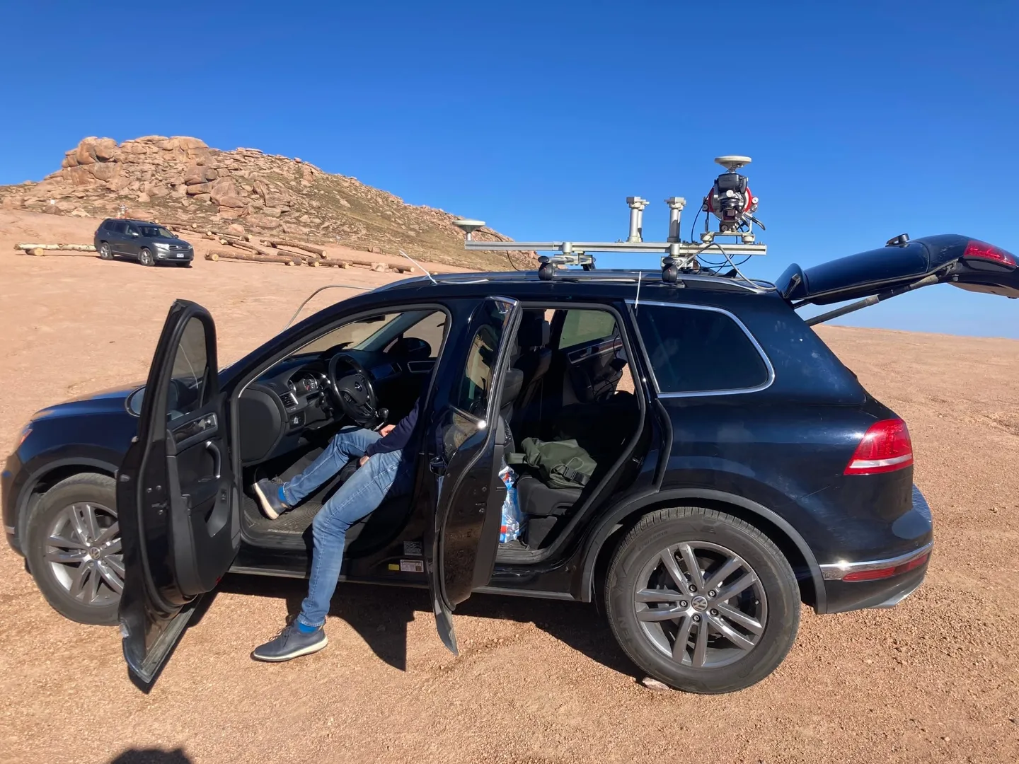 LiDAR-equipped survey vehicle at the Pikes Peak summit, Colorado plains 1,440 metres below