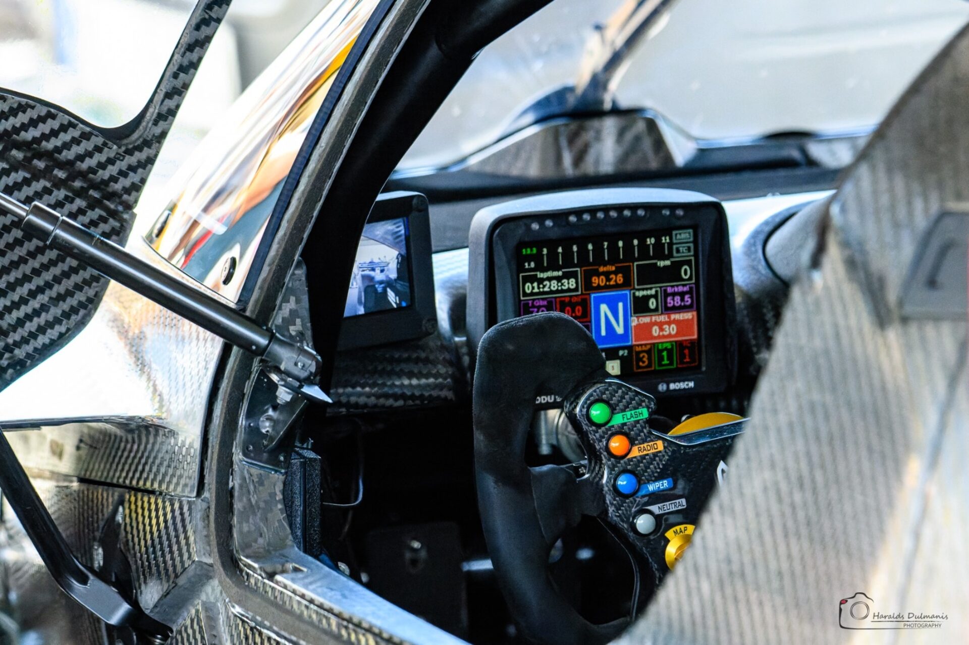 Kalana cockpit — Bosch display, carbon steering wheel, and data readouts